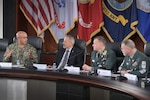 Navy Rear Admiral George Bresnihan, commander of Defense Logistics Agency Energy discuss military fuel support with Norway defense team.