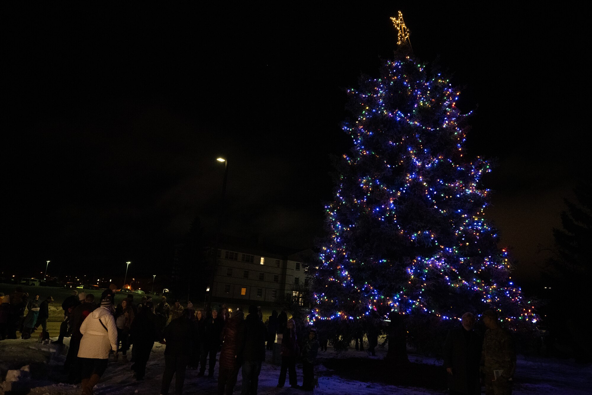Families, friends and service members united as a community to celebrate the holiday season with various special events leading up to the tree-lighting ceremony.