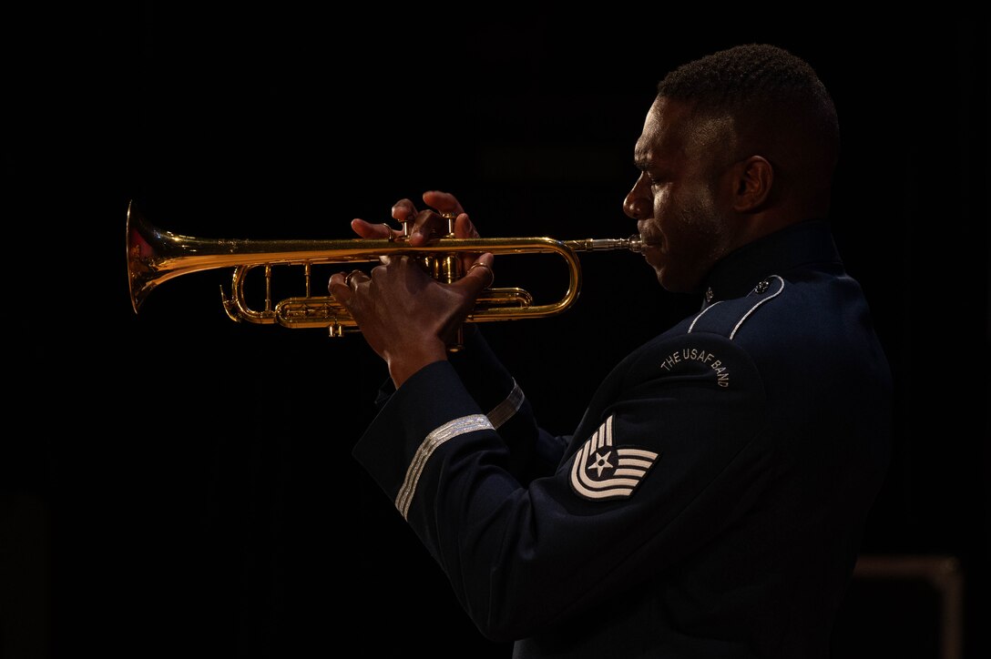 Airman playing a trumpet