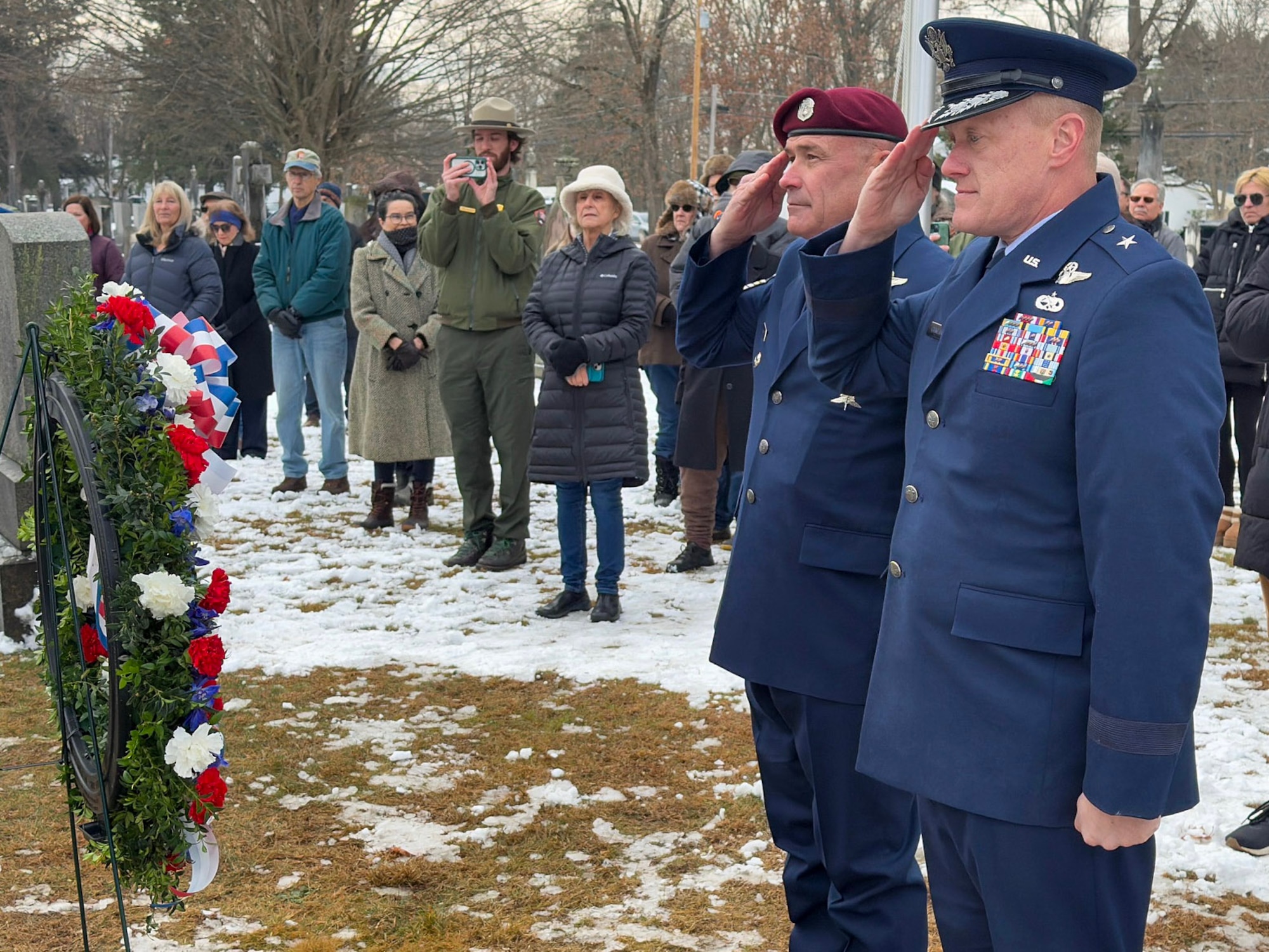 New York Air National Guard Brigadier General Gary Charlton and Command Chief Master Sergeant Michael Hewson salute  after the placing a wreath from the White House during the annual wreath laying ceremony marking the birthday of President Martin Van Buren in Kinderhook, New York, on Dec. 5, 2024.