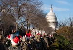 More than 450 members of the District of Columbia National Guard, Maryland National Guard, Virginia National Guard, National Guard Bureau (NGB), various DoD partners, D.C. Government Operations-DCNG, Mayor’s Office of Veterans Affairs, and ROTC programs participated in a 5-mile holiday toy ruck in partnership with Children’s National Hospital, in Washington, D.C., Dec. 7, 2024. Participants were asked to bring a toy or purchase one. Additional donations were collected during a holiday toy drive at the D.C. Armory and the Herbert R. Temple Jr. Army National Guard Readiness Center (TARC), and later presented to children who will spend the holidays at the Children’s National Hospital.