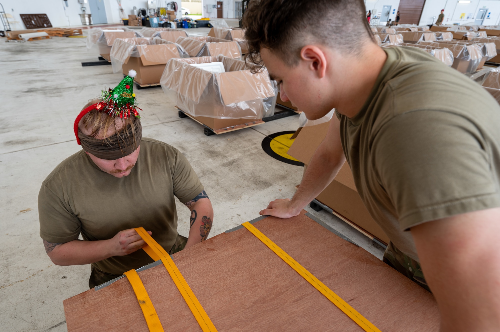 LRS Airmen prepare bundles for Operation Christmas Drop 2024