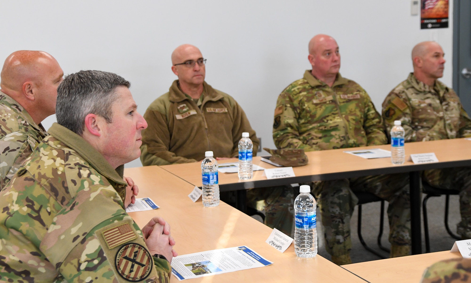 Military members in a meeting