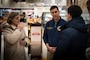 NAVAL SUPPORT ACTIVITY NAPLES, Italy (December 5, 2024) Vittorio Lettieri (right), Mayor of Gricignano, Aversa, Italy engages with Capt. John Randazzo (center), Commander, Naval Support Activity (NSA) Naples, Italy, during a tour of the commissary onboard NSA Support Site in Gricignano Dec. 5, 2024. The visit provided an opportunity to strengthen the partnership between NSA military community and Gricignano community. NSA Naples is an operational ashore base that enables U.S., allied, and partner nation forces to be where they are needed, when they are needed to ensure and stability in the European, African, and Central Command areas of responsibility. (U.S. Navy photo by Mass Communication Specialist 1st Class Haydn N. Smith)