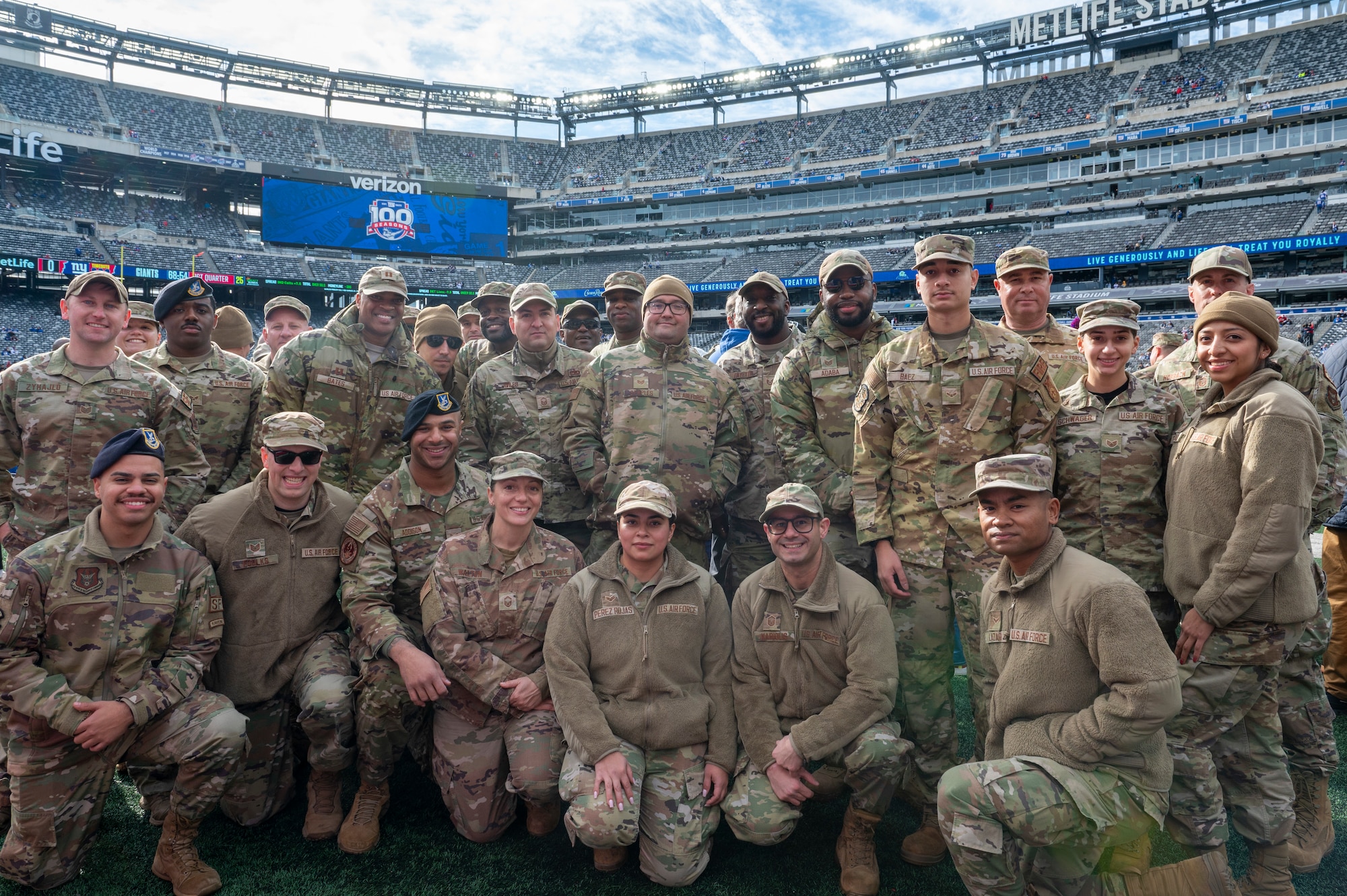 Reserve Citizen Airmen from the 514th Air Mobility Wing, Joint Base McGuire-Dix-Lakehurst, N.J., attend and participate in a Salute to Service New York Giants game at MetLife Stadium, N.J., November 17, 2024. Prior to the game, the Freedom Wing members were invited onto the field to watch the warm-ups and pose for photos with Giants players. As the game began, they formed the gauntlet through which the Giants ran to take the field.