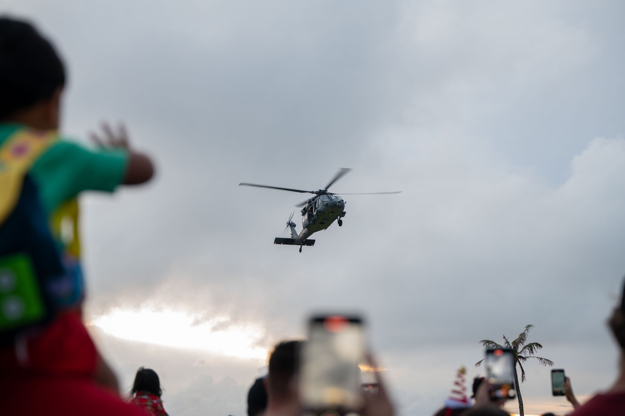 Family and friends rallied together at the Tree Lighting Ceremony to celebrate the start of the holiday season by meeting Santa and enjoying live music, face painting, games and more. (U.S. Air Force photo by Airman 1st Class Audree Campbell)