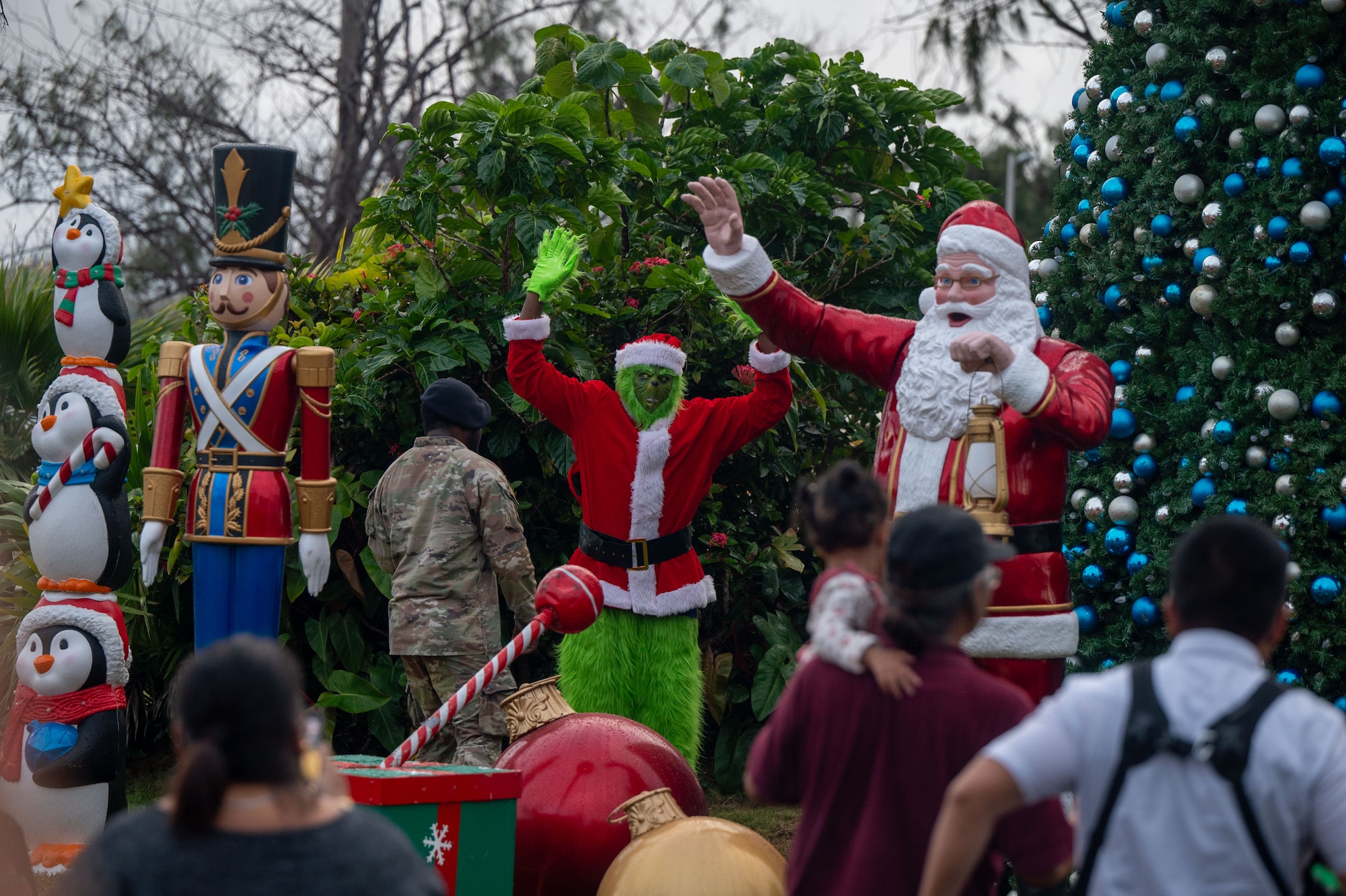 Family and friends rallied together at the Tree Lighting Ceremony to celebrate the start of the holiday season by meeting Santa and enjoying live music, face painting, games and more. (U.S. Air Force photo by Airman 1st Class Audree Campbell)