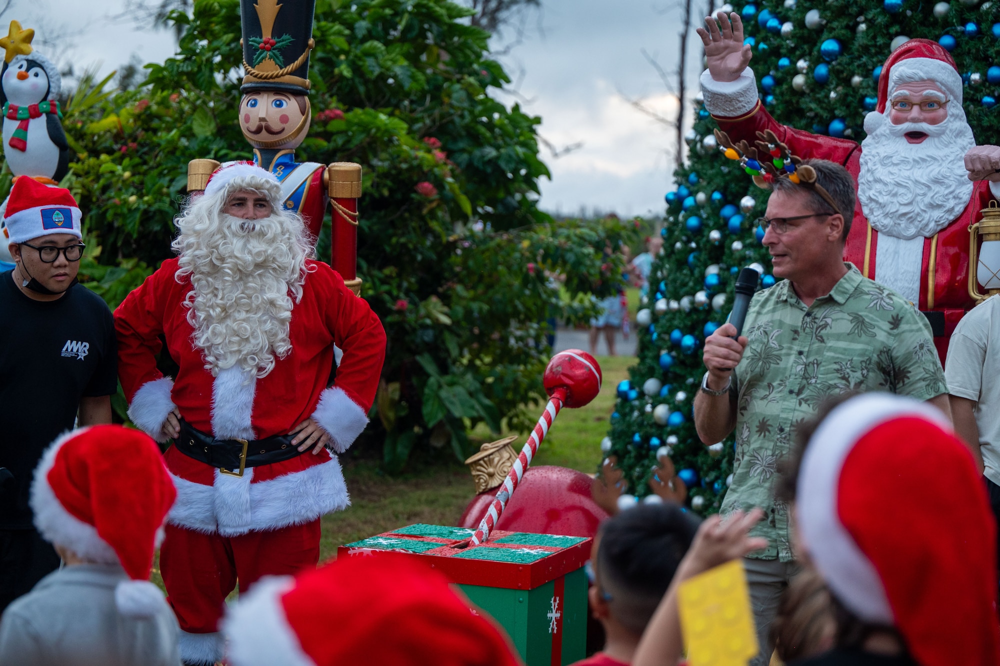 Family and friends rallied together at the Tree Lighting Ceremony to celebrate the start of the holiday season by meeting Santa and enjoying live music, face painting, games and more. (U.S. Air Force photo by Airman 1st Class Audree Campbell)