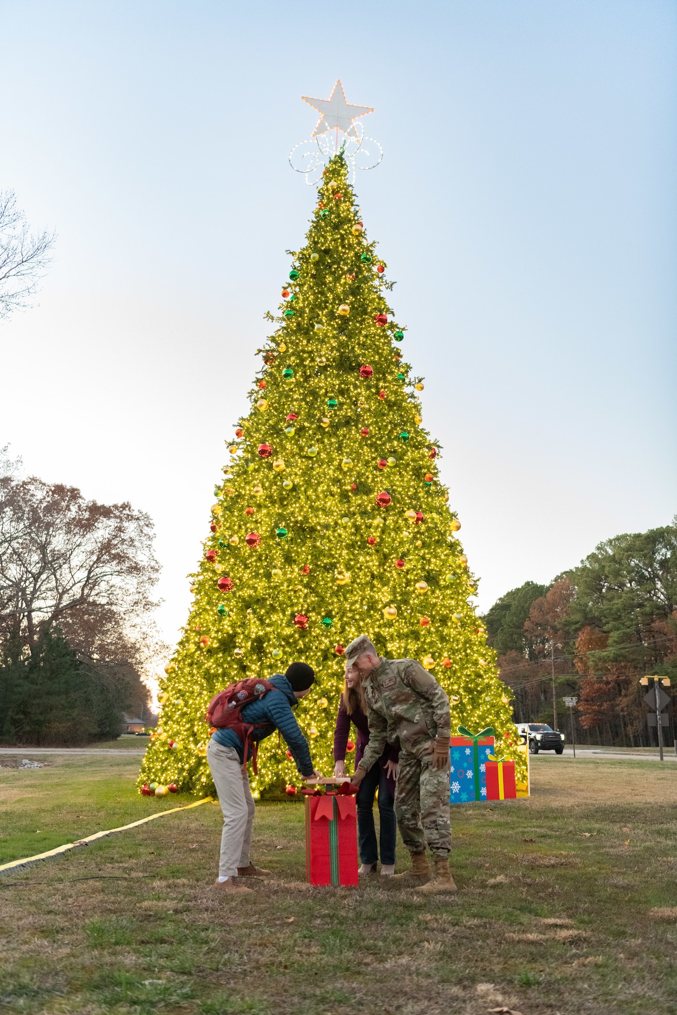 The Christmas tree at Arnold Air Force Base, Tenn., is lit during a lighting ceremony Dec. 3, 2024. This is the second year in a row Arnold team members and their families have gathered for the ceremony. The tree, purchased in 2023, measures 40 feet tall and 22 feet wide. It is decorated with approximately 300 ball ornaments and is topped with a 5-foot 3D five-point star. (U.S. Air Force photos by Keith Thornburgh)