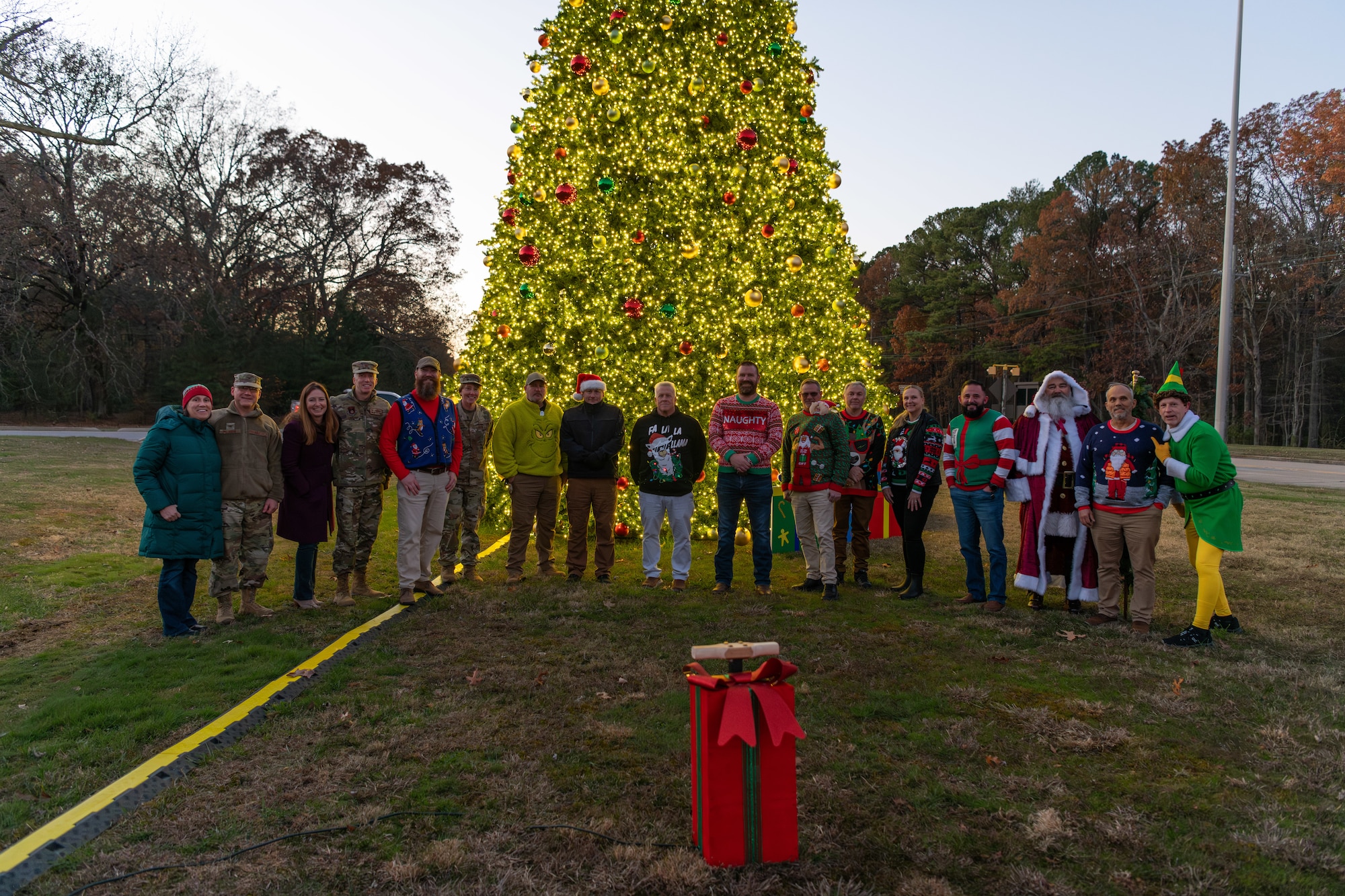 The Christmas tree at Arnold Air Force Base, Tenn., is lit during a lighting ceremony Dec. 3, 2024. This is the second year in a row Arnold team members and their families have gathered for the ceremony. The tree, purchased in 2023, measures 40 feet tall and 22 feet wide. It is decorated with approximately 300 ball ornaments and is topped with a 5-foot 3D five-point star. (U.S. Air Force photos by Keith Thornburgh)