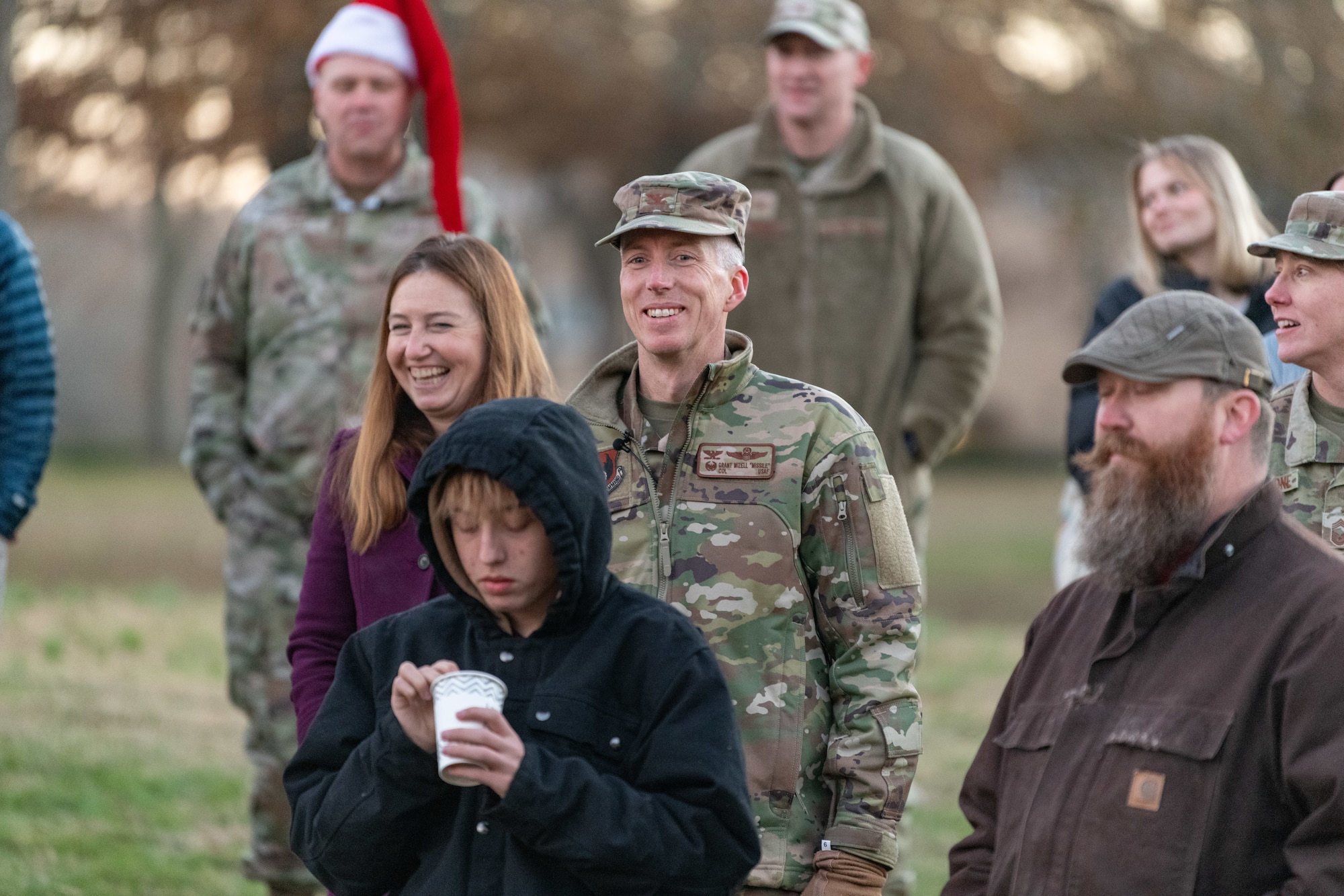 The Christmas tree at Arnold Air Force Base, Tenn., is lit during a lighting ceremony Dec. 3, 2024. This is the second year in a row Arnold team members and their families have gathered for the ceremony. The tree, purchased in 2023, measures 40 feet tall and 22 feet wide. It is decorated with approximately 300 ball ornaments and is topped with a 5-foot 3D five-point star. (U.S. Air Force photos by Keith Thornburgh)