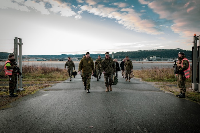 The 39th Commandant of the U.S. Marine Corps, Gen. Eric M. Smith, tours the Værnes Airport with Norwegian Brig. Gen. Anders Jernberg, the Commander for Norway Defense Logistic Organization, at the Værnes Airport, Norway on Oct. 26, 2024. General Smith was in Norway for scheduled office calls with Norwegian defense officials and to speak with Marines and recognize their accomplishments. (U.S. Marine Corps photo by Staff Sgt. Kelsey Dornfeld).