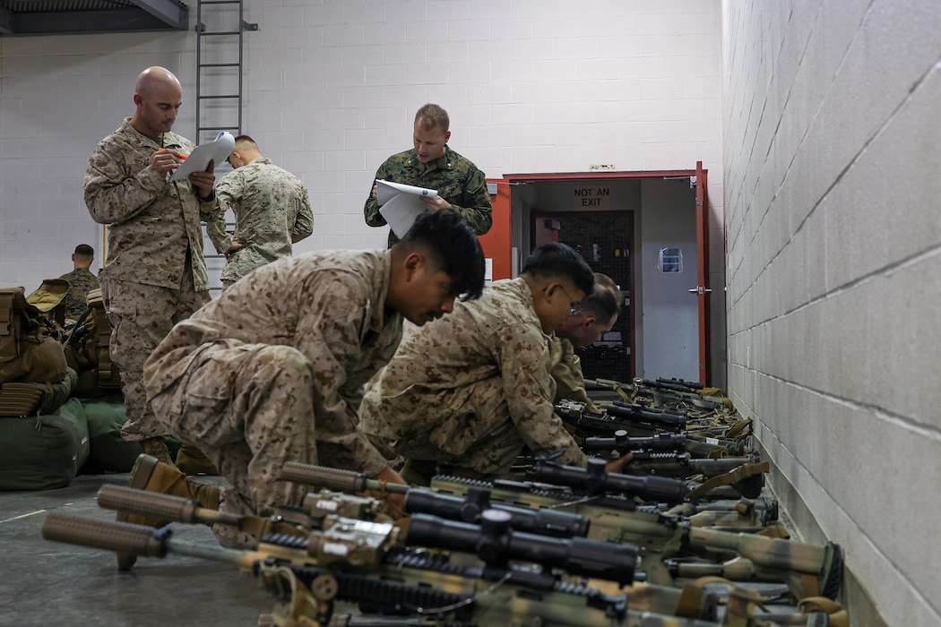 U.S. Marines with Fox Company, 2nd Battalion, 23d Marine Regiment, 4th Marine Division, get accountability of issued rifles on the last day of their activation period for the unit deployment program at Camp Williams, Utah, Nov. 3, 2024. The activation marks the beginning of an intensive period of training for 2nd Battalion, 23d Marines as they provide a total force solution in support of the UDP by aligning Marine Forces Reserve’s commitment to Marine Corps strategic objectives. This marks the first time since 2020 that an entire Reserve infantry battalion has activated to support the Unit Deployment Program. (U.S. Marine Corps photo by Cpl. Aaron TorresLemus)