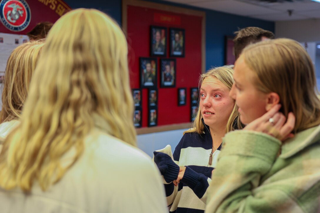 Family members of U.S. Marines, with 2nd Battalion, 2nd Marine Regiment, leaving for the Unit Deployment Program, express their thoughts and emotions before their Marines leave at Camp Williams, Utah, Nov. 3, 2024. The activation marks the beginning of an intensive period of training for 2nd Battalion 23d Marines as they provide a total force solution in support of the UDP by aligning Marine Forces Reserve’s commitment to Marine Corps strategic objectives. This marks the first time since 2020 that an entire Reserve infantry battalion has activated to support the Unit Deployment Program. (U.S. Marine Corps photo by Cpl. Aaron TorresLemus)