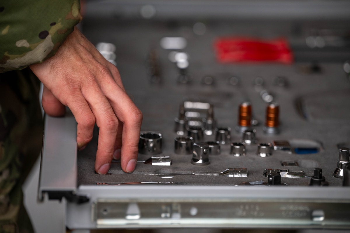 a weapons load crew chief prepares equipment for a weapons maintenance operation