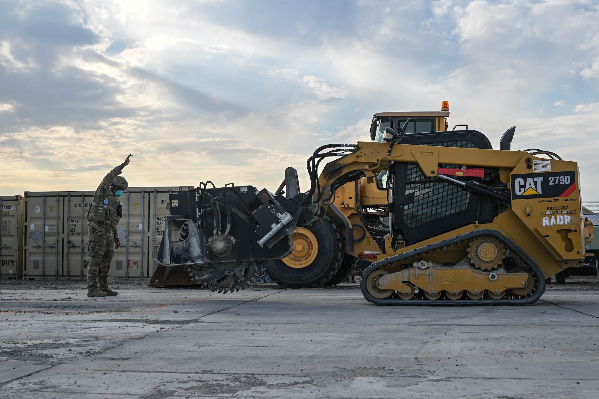 An Airman operates a piece of heavy equipment during an exercise.