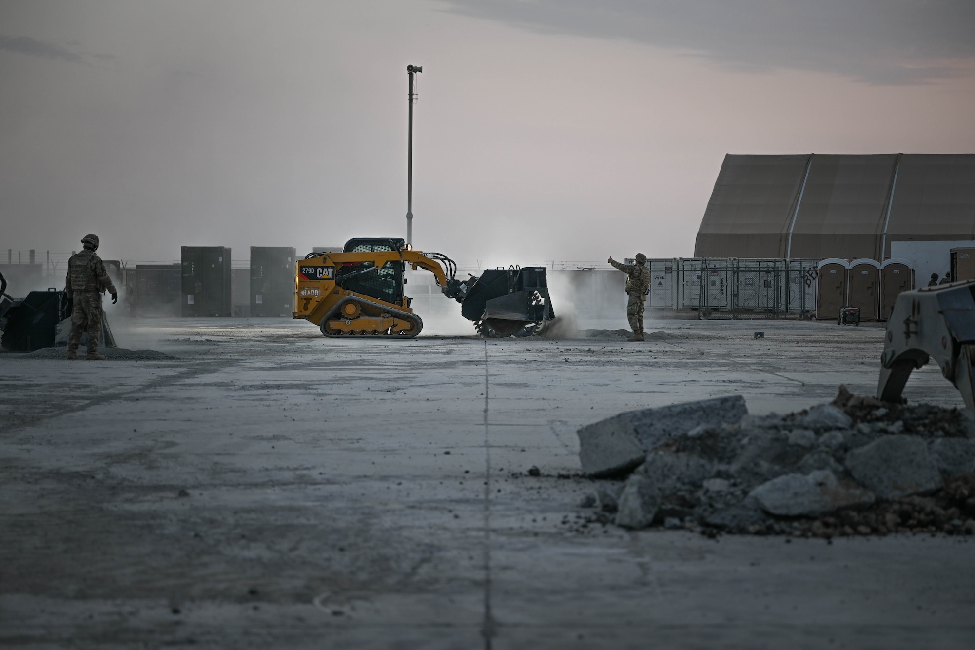 Airman work on a simulated airfield during an exercise.