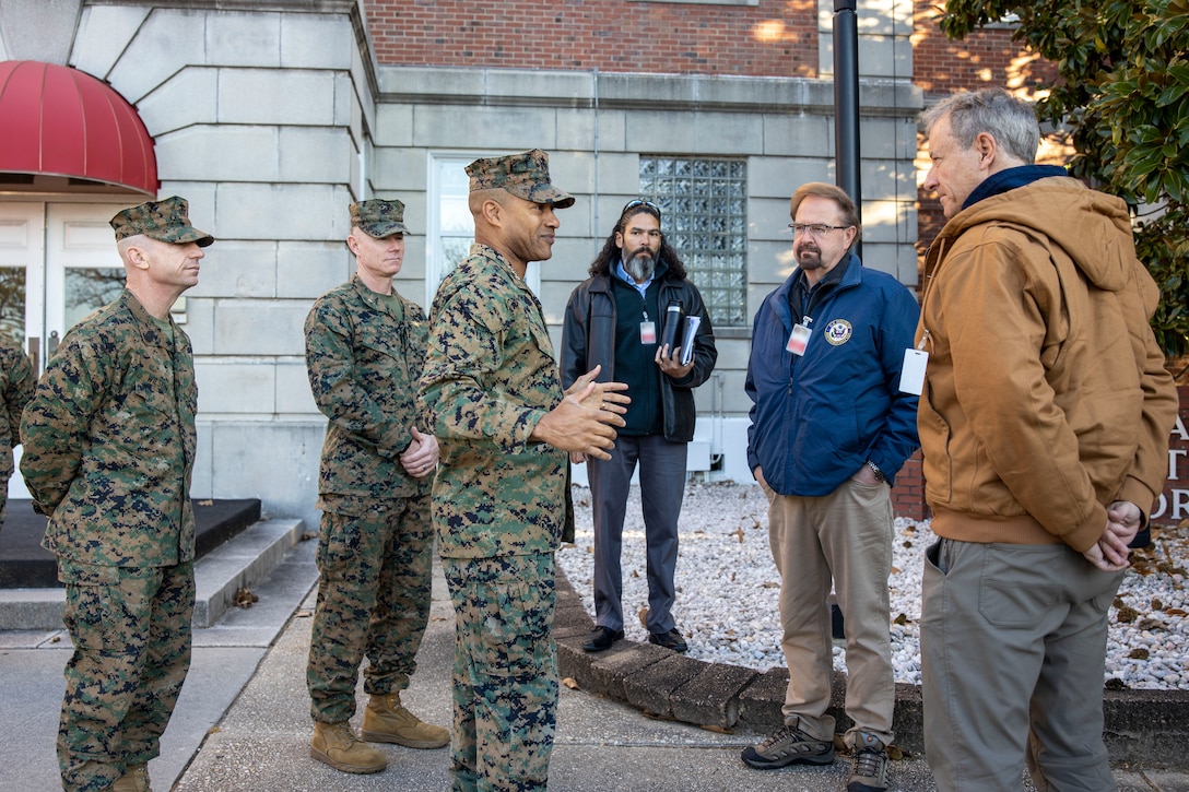 U.S. Marines with II Marine Expeditionary Force, greet U.S. House of Representatives Chuck Edwards (R-NC) and Matt Cartwright (D-PA) at Marine Corps Base Camp Lejeune, North Carolina, Dec. 2, 2024. The Congressional Delegation (CODEL) was a bi-partisan visit consisting of House Appropriations Subcommittee on Defense (HAC-D) representatives who learned more about II MEF operations, capabilities and address issues related to DoD appropriations in North Carolina. (U.S. Marine Corps photo by Sgt. Jacquilyn Davis) (This photo has been altered for security purposes by blurring out identification badges.)