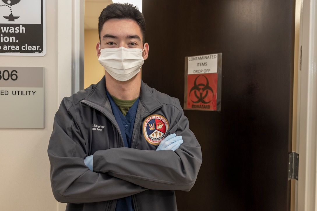 U.S. Navy Hospital Corpsman 3rd Class Cody Slaughter, a dental assistant with 2nd Dental Battalion, 2nd Marine Logistics Group, and a native of Abilene, Texas, poses for a photo on Camp Lejeune, North Carolina, Dec. 5, 2024. Slaughter was selected as warrior of the week for his dedication, leadership and work ethic that his command says sets him apart from his peers, ensuring mission success. When asked about his favorite part of his job, Slaughter said, “I think my favorite part of my job is interacting with the patients. It is rewarding to see someone who wasn’t confident in their smile, get up and look in the mirror after an operation and smile proudly.” Each week, 2nd MLG recognizes one outstanding Marine or Sailor that goes above and beyond in their duties and embodies the qualities of an outstanding service member. (U.S. Marine Corps photo by Cpl. Jessica J. Mazzamuto)