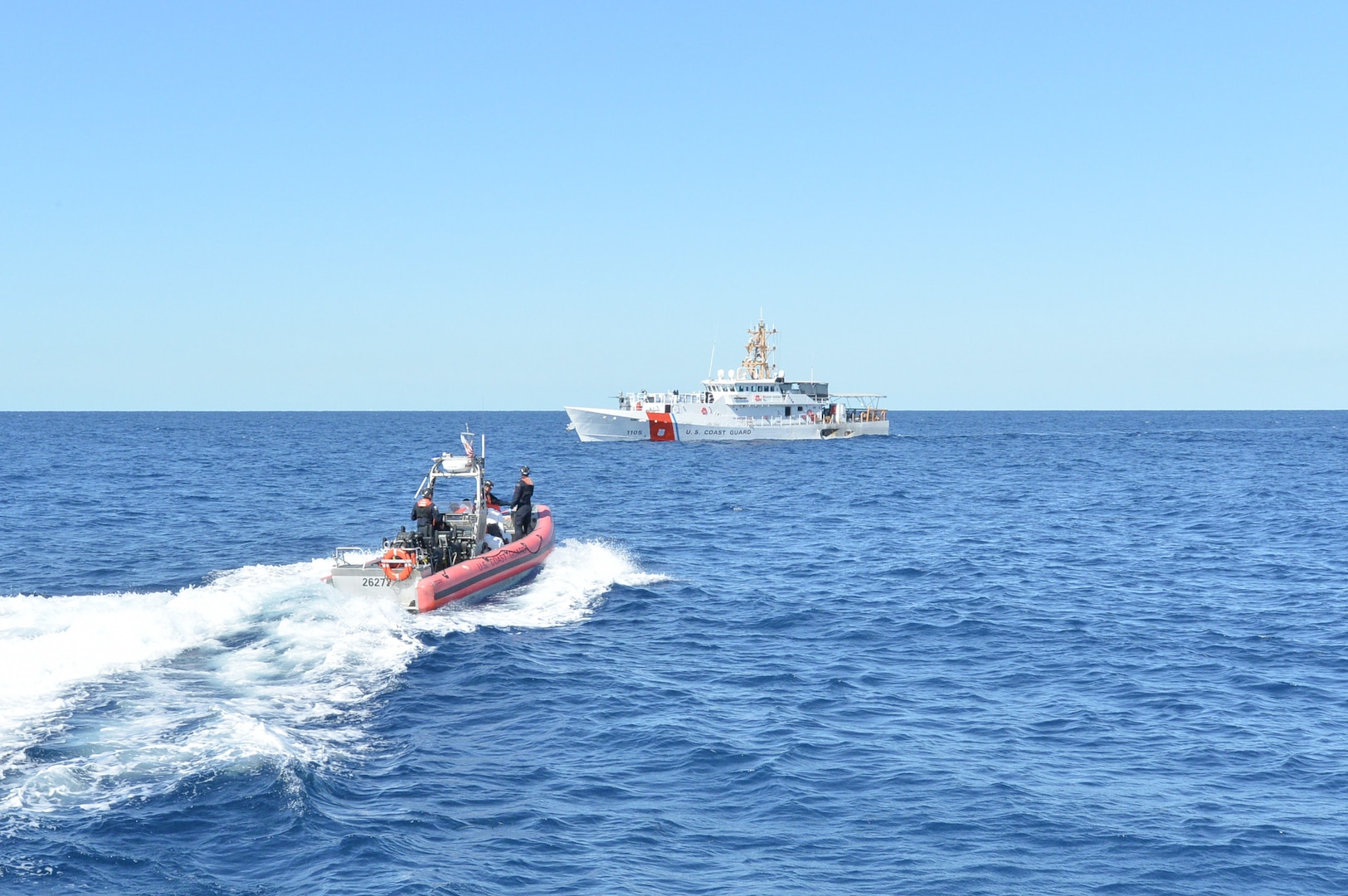 A Coast Guard Cutter Alert (WMEC 630) small boat crew transfers migrants to Coast Guard Cutter Margaret Norvell (WPC 1105), Nov. 24, 2024, while underway in the Florida Straits. Alert conducted a 60-day, maritime safety and security patrol in the Florida Straits; the deployment marked its first since the cutter shifted home ports from Astoria, Oregon to Cape Canaveral, Florida in June of this year. (U.S. Coast Guard photo)