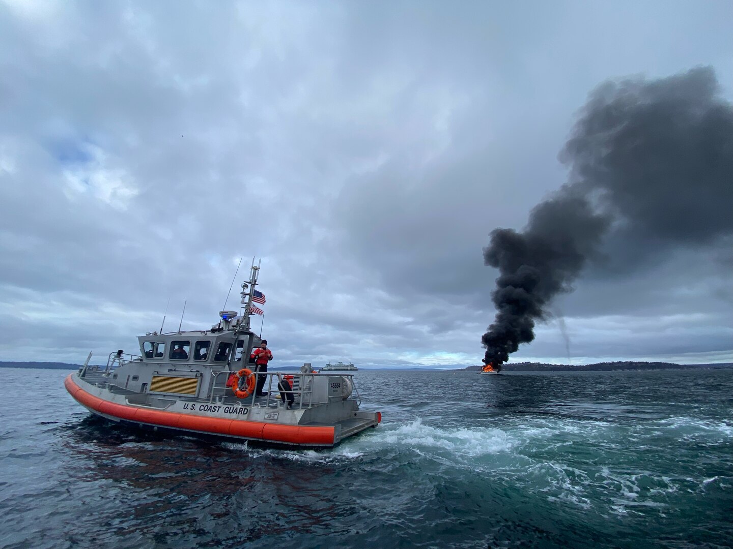 Emergency crews respond to boat fire in Elliot Bay, Washington