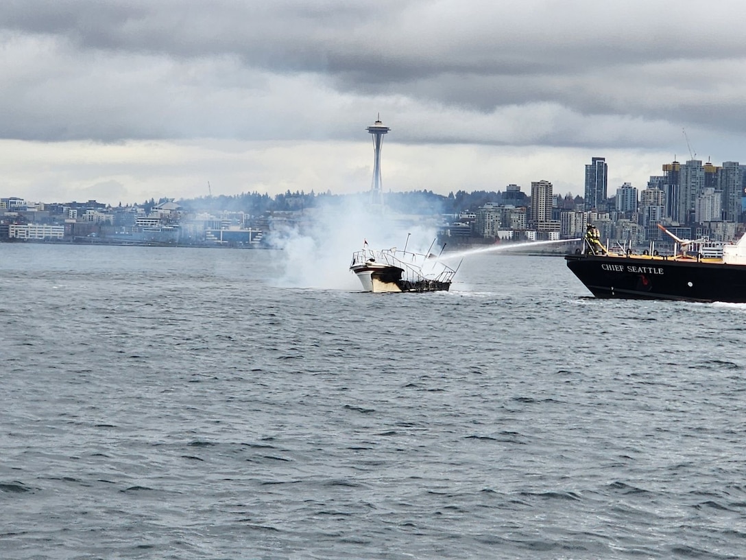 Emergency crews respond to boat fire in Elliot Bay, Washington