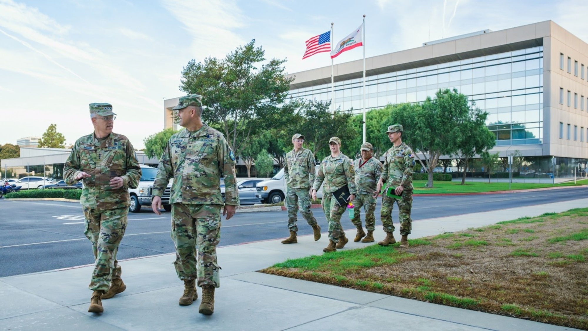 USSF Lt. Gen. Philip Garrant, commander of Space Systems Command (SSC), left, walks with USSF Brig. Gen. Anthony J. Mastalir commander of U.S. Space Forces Indo-Pacific (SFI) toward The Aerospace Corporation campus in El Segundo, Cal. on Oct. 30, 2024 to attend day two of Space Warfighters Day conference. The two-day event paired USINDOPACOM, the nation’s largest and oldest combatant command, with the U.S. Space Force, the nation’s newest – and smallest – military branch, for the purpose of bringing game-changing capabilities to bear in defense of our Nation, Allies, and strategic interests.