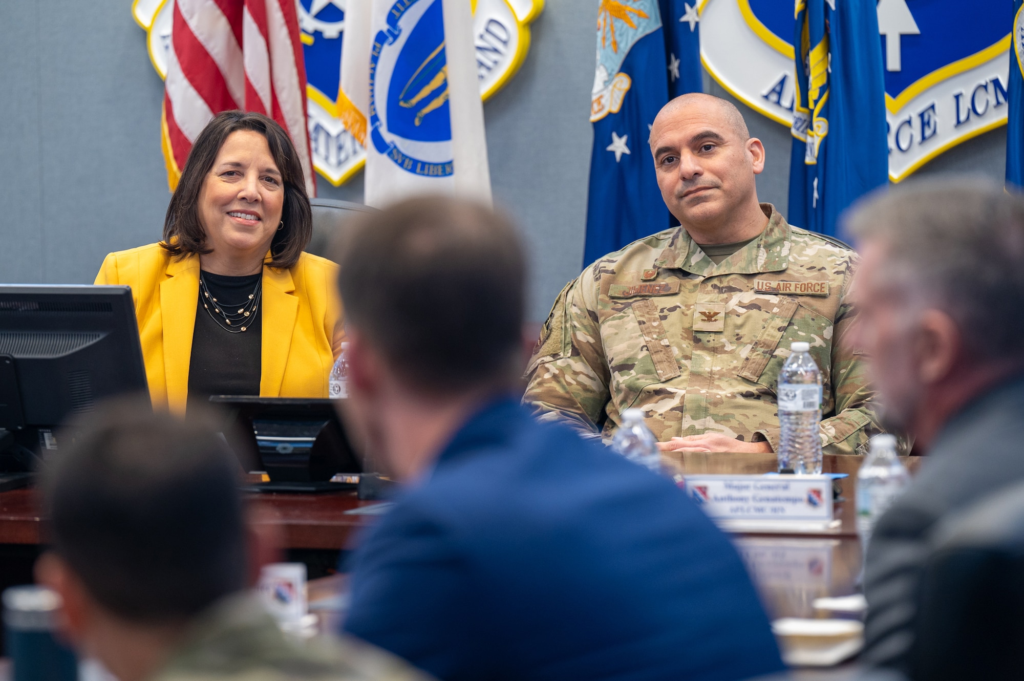 Image of people in briefing.