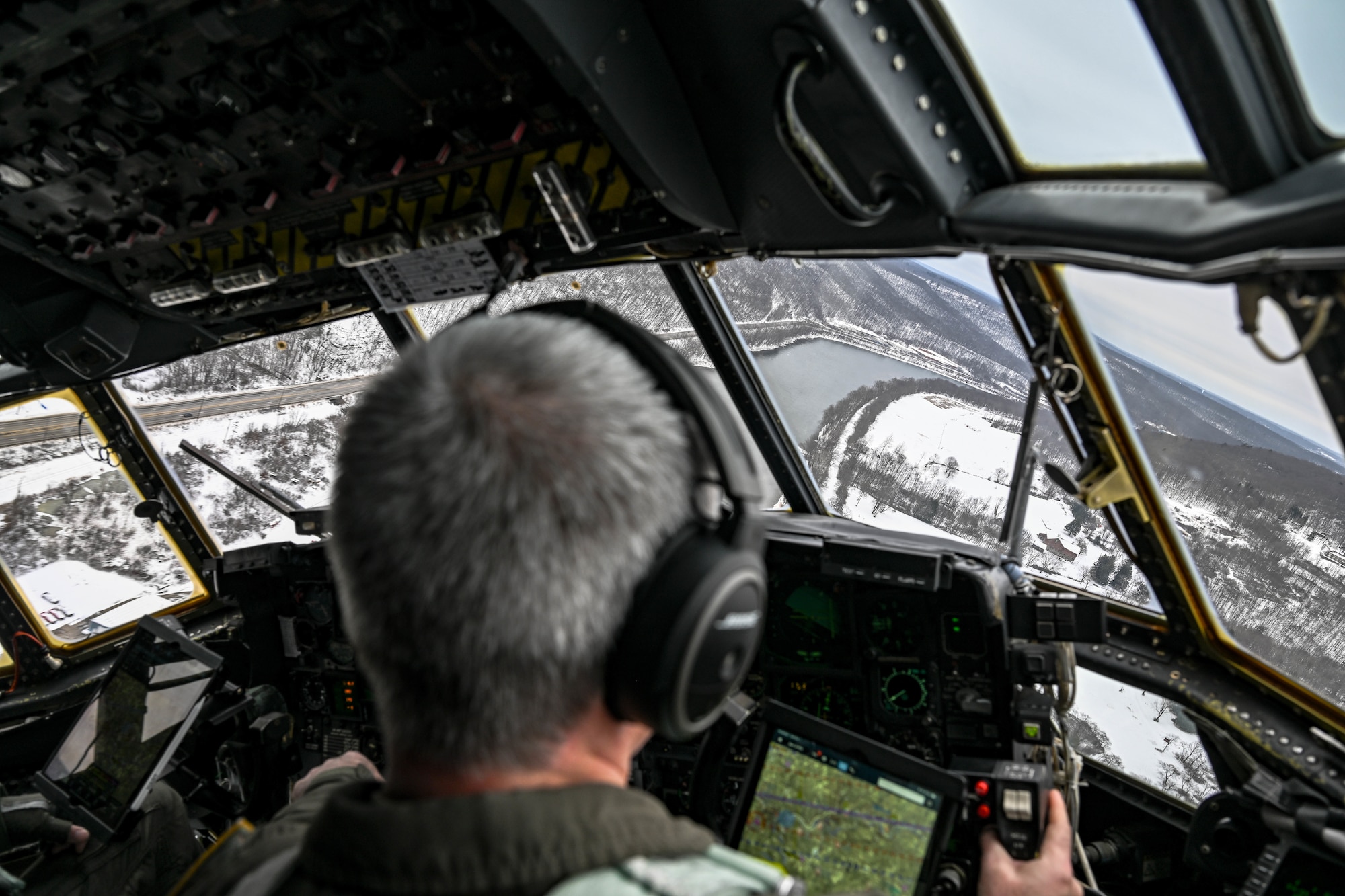 Aircrew with the 757th Airlift Squadron fly a C-130H Hercules over the Allegheny River Valley during an incentive flight for spouses, Dec. 7, 2024.