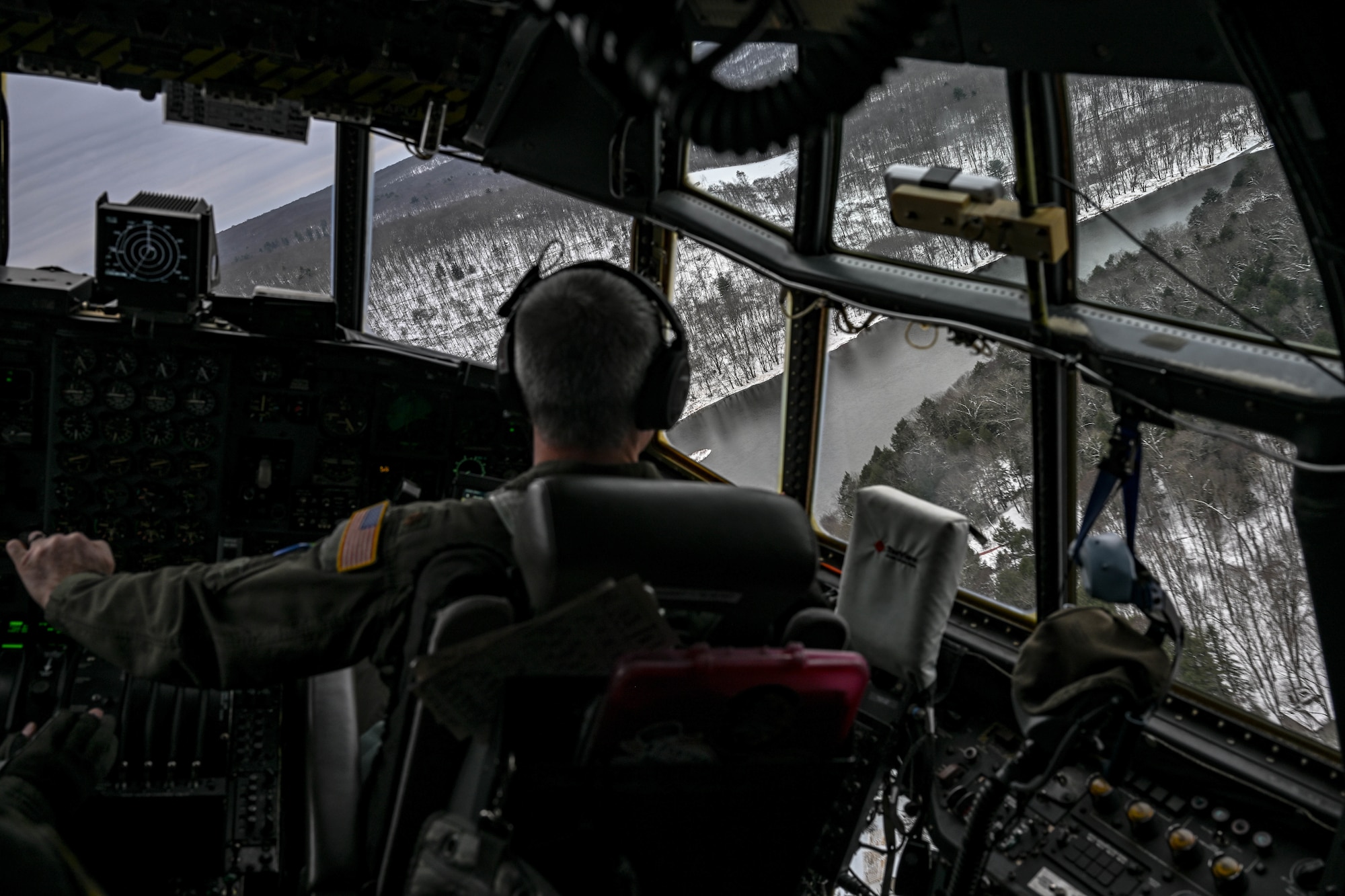 Aircrew with the 757th Airlift Squadron fly a C-130H Hercules over the Allegheny River Valley during an incentive flight for spouses, Dec. 7, 2024.