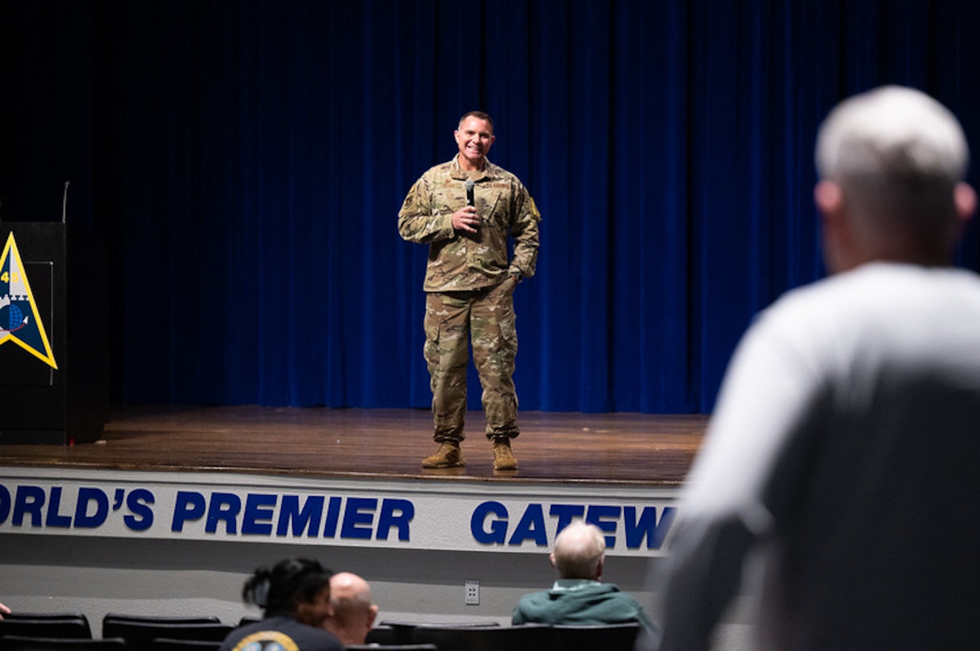 Col. Josh Peter, 45th Medical Group commander, addresses audience members during a town hall meeting.