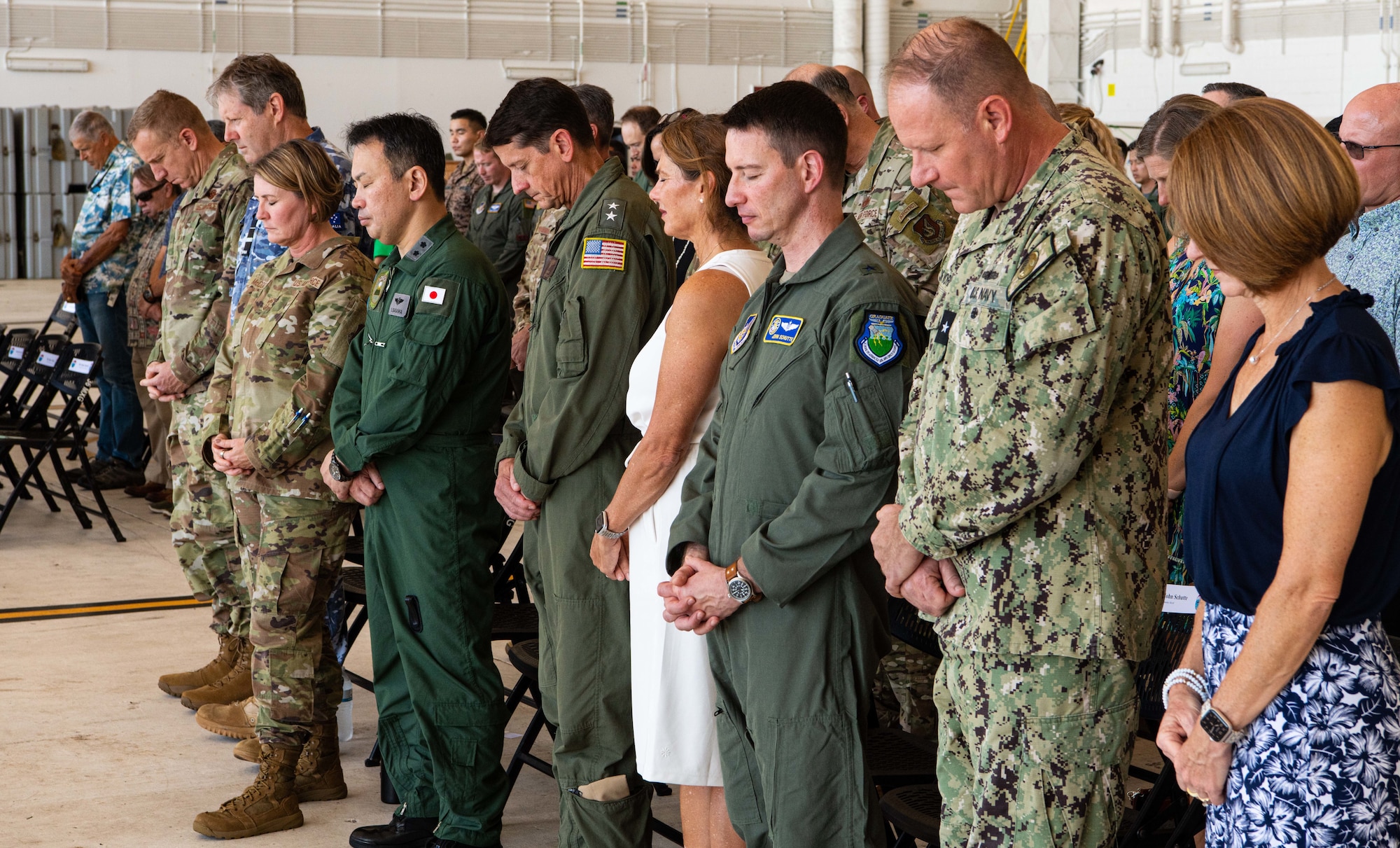 Leaders from across the Indo-Pacific theater pray together during the Operation Christmas Drop 2024 “Push Ceremony” at Andersen Air Force Base, Guam, Dec. 9, 2024.