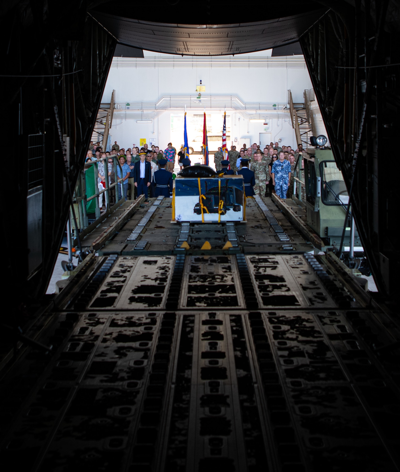 A ceremonial bundle sits waiting to be pushed into the back of a C-130 Hercules aircraft during the Operation Christmas Drop 2024 “Push Ceremony” at Andersen Air Force Base, Guam, Dec. 9, 2024.