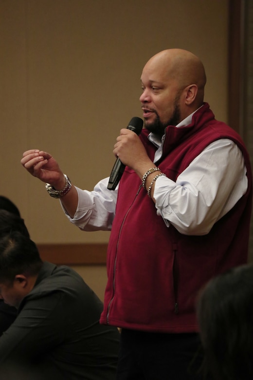 Quincy McNeil, Contracting Officer, U.S. Army Corps of Engineers – Far East District, preposes stakeholders meet with customers early in the design process to address characteristics, funding and functionality. This will assist contractors when identifying and refining the budget at the Engineering Quality Symposium from Nov. 13-14, 2024, at Camp Humphreys, South Korea. (U.S. Army photo by Monique Freemon)