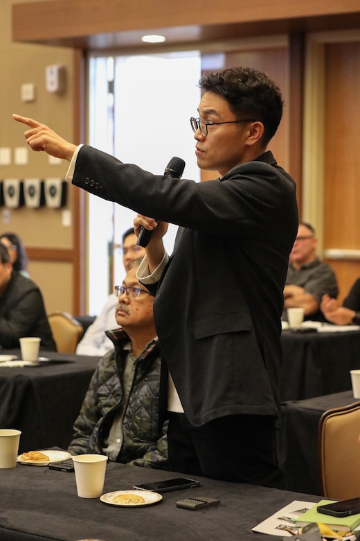The U.S. Army Corps of Engineers – Far East District’s Cost Engineering Branch and Minjae Park, Chief of Geotechnical and Environmental Engineering Branch, discussing the quality and design of temporary works (e.g., scaffolding and temporary power) at the Engineering Quality Symposium from Nov. 13-14, 2024, at Camp Humphreys, South Korea. (U.S. Army photo by Monique Freemon)