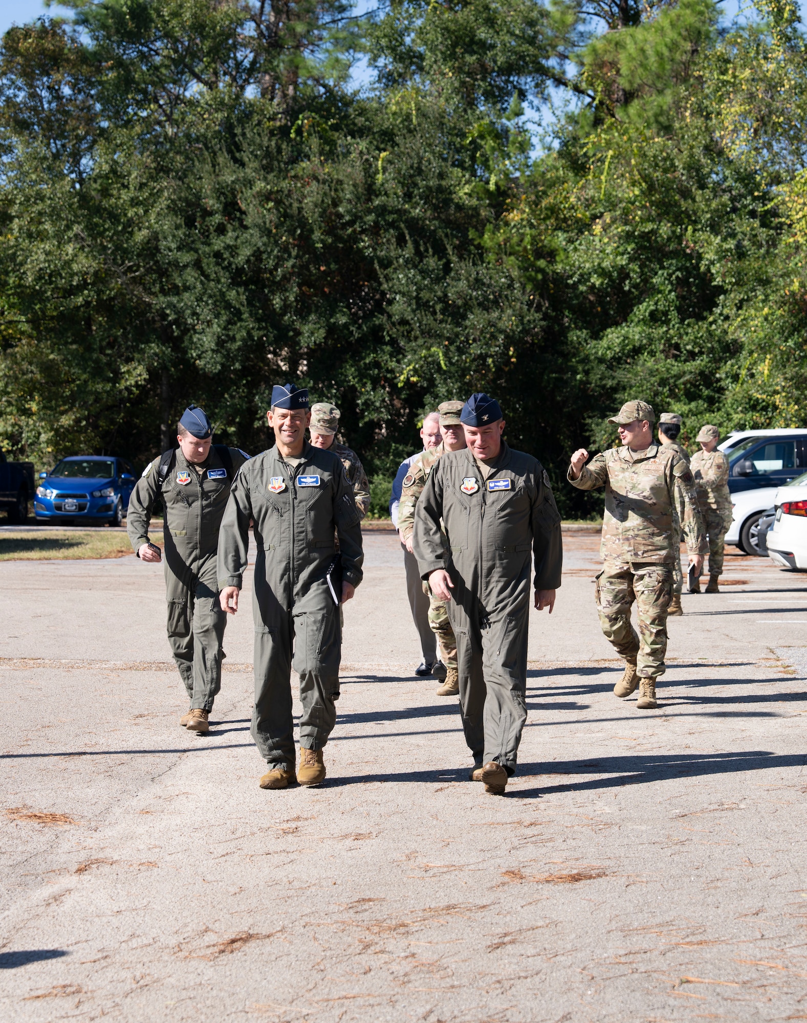 photo of uniformed U.S. Air Force Airmen walking in a parking lot
