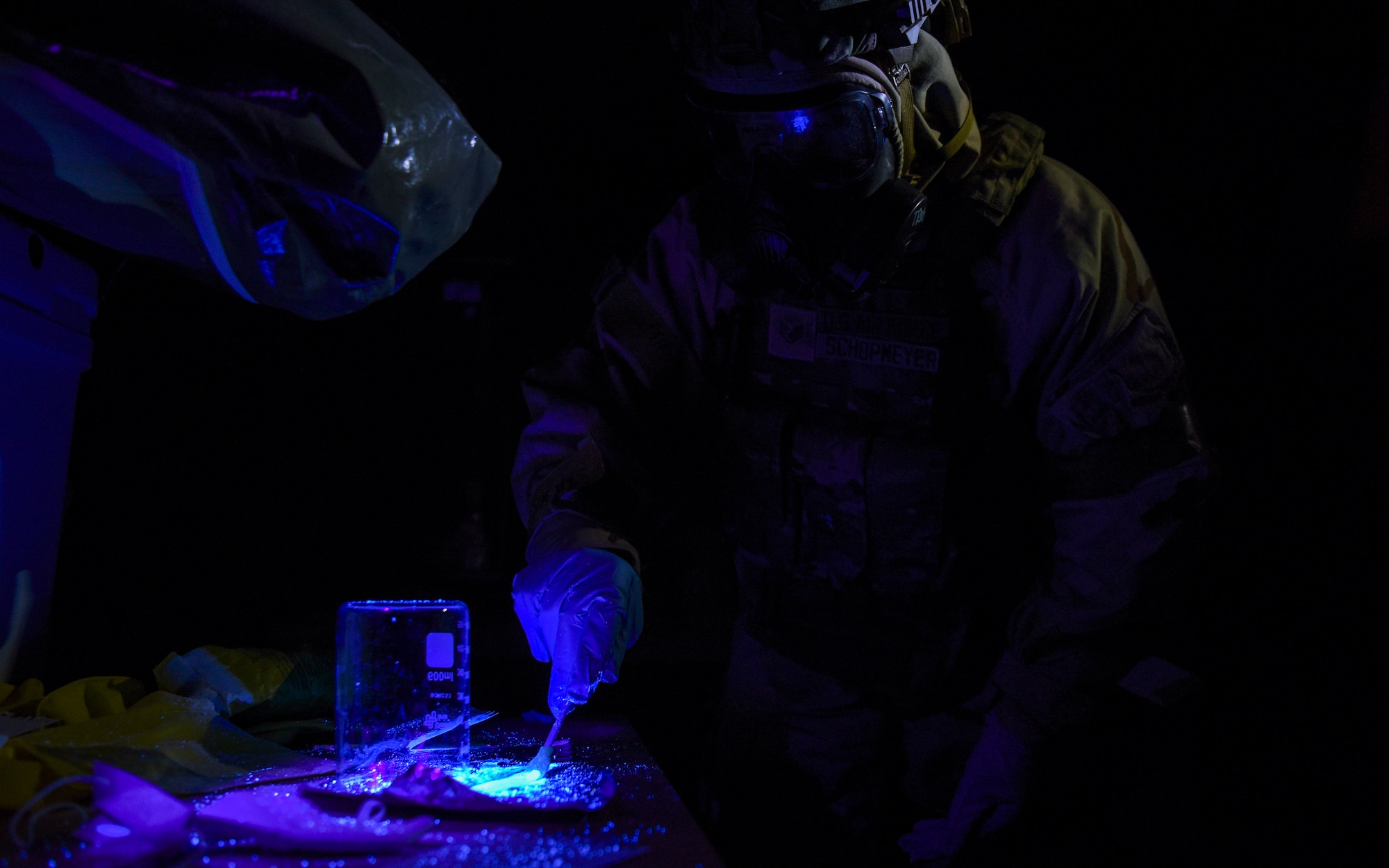 U.S. Air Force Staff Sgt. Philip Schopmeyer, 100th Civil Engineer Squadron emergency management journeyman, collects a sample of a simulated narcotic during a Prime Base Engineer Emergency Force (Prime BEEF) readiness day at Royal Air Force Mildenhall, England, Nov. 21, 2024.