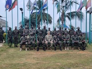 U.S. Army Brig. Gen. Ravindra Wagh, assistant adjutant general of the Michigan National Guard, with members of the Armed Forces of Liberia’s 23rd Infantry Brigade at Edward Binyah Kesselly Barracks, Dec. 4, 2024. Michigan and Liberia have partnered for 15 years under the Department of Defense National Guard Bureau State Partnership Program.