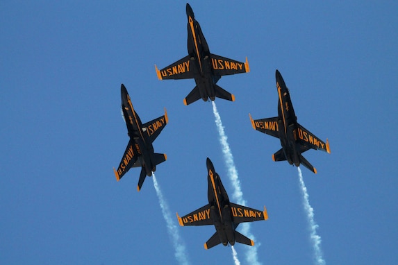 Diamond pilots assigned to the U.S. Navy flight demonstration squadron, the Blue Angels, perform the barrel role break maneuver during the Fort Worth Air Power Expo at Naval Air Station Joint Reserve Base Fort Worth. The Blue Angels are scheduled to perform 68 demonstrations at 34 locations across the U.S. in 2014, including one at Pease Air National Guard Base in Newington, N.H. (U.S. Navy photo by Mass Communication Specialist 2nd Class Jonathan Vargas/Released)