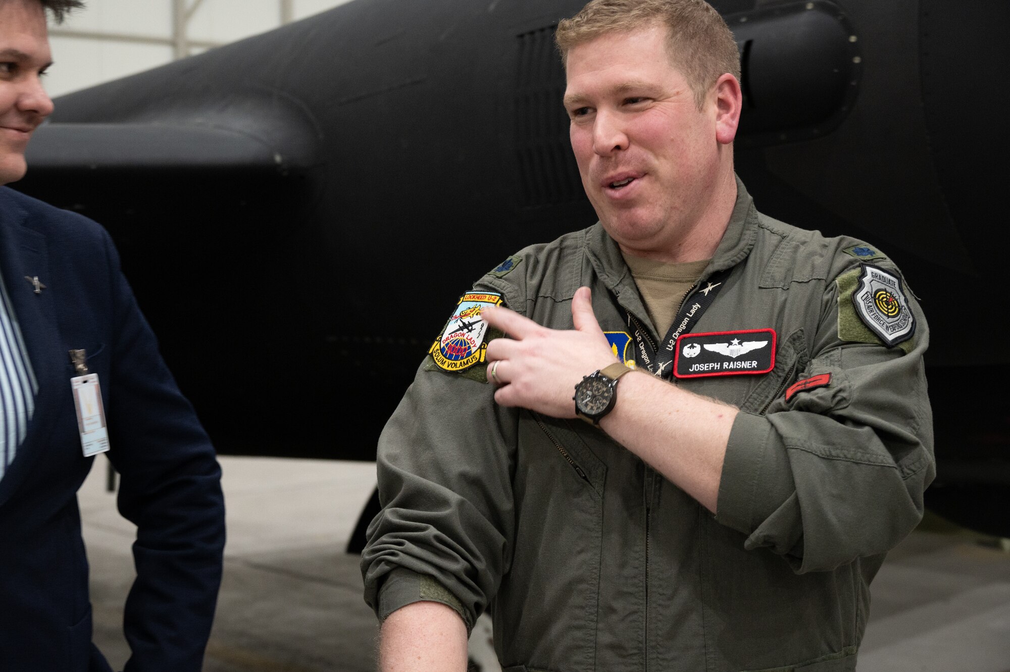 U.S. Air Force Lt. Col. Joseph J. Raisner, 99th Expeditionary Reconnaissance Squadron (ERS) commander, talks with visitors