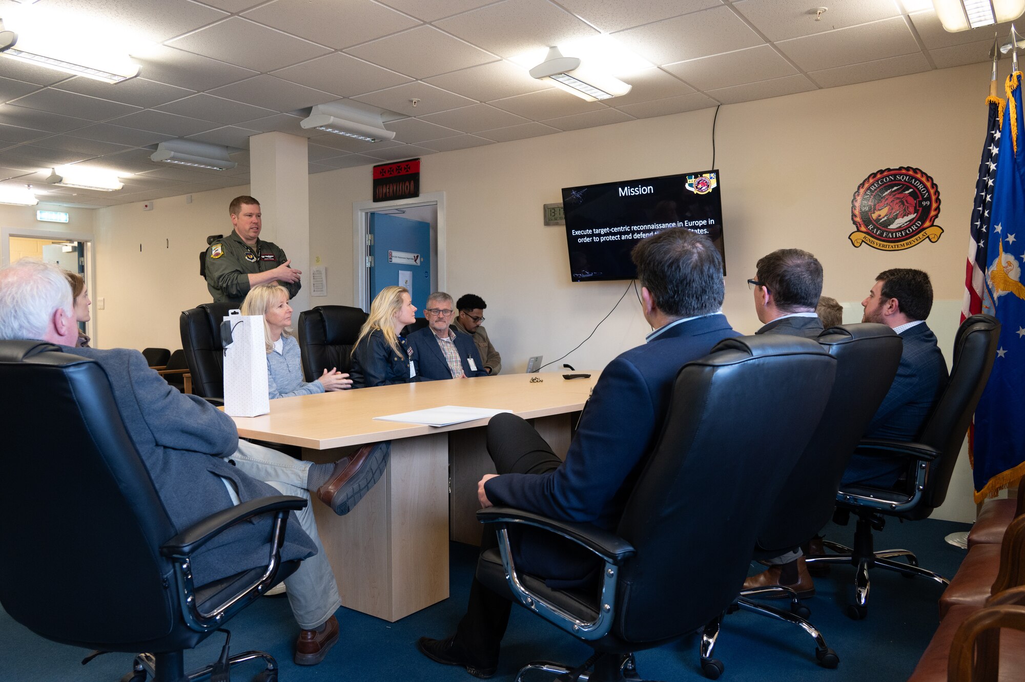 U.S. Air Force Lt. Col. Joseph J. Raisner, 99th Expeditionary Reconnaissance Squadron (ERS) commander, briefs visitors