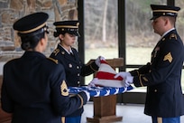 U.S. Army Honor Guard Soldiers with the New Jersey Army National Guard fold an American flag during the ceremony for U.S. Army Air Forces 2nd Lt. William Scott at the Brigadier General William C. Doyle Veterans Memorial Cemetery in Wrightstown, New Jersey, Dec. 9, 2024. Scott, a navigator on a B-24 Liberator bomber, was killed when his aircraft was shot down during Operation Tidal Wave over Ploiești, Romania, Aug. 1, 1943.