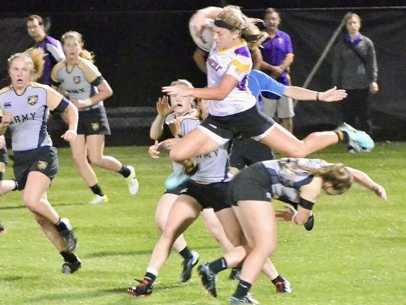 U.S. Army Sgt. Autumn Czaplicki, then a freshman at West Chester University and playing for the school’s rugby team, hurdles an Army West Point player during a match in West Point, New York, Sept. 15, 2018. Czaplicki is now a Pennsylvania National Guard Soldier and an athlete in the Army’s World Class Athlete Program. (Courtesy Photo)