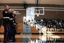 U.S. Marines with Marine Band San Diego, Headquarters and Service Battalion, Marine Corps Recruit Depot San Diego, perform for students at Salesian High School in Los Angeles, California, Nov. 20, 2024. The Marine Band San Diego’s job is to provide ceremonial music, boost morale and participate in outreach work and attend events and ceremonies. (U.S. Marine Corps photo by Cpl. Sarah M. Grawcock)