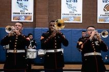 U.S. Marines with Marine Band San Diego, Headquarters and Service Battalion, Marine Corps Recruit Depot San Diego, perform for students at Salesian High School in Los Angeles, California, Nov. 20, 2024. The Marine Band San Diego’s job is to provide ceremonial music, boost morale and participate in outreach work and attend events and ceremonies. (U.S. Marine Corps photo by Cpl. Sarah M. Grawcock)
