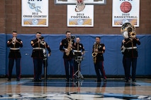 U.S. Marines with Marine Band San Diego, Headquarters and Service Battalion, MCRD San Diego, perform for students at Salesian High School in Los Angeles, California, Nov. 20, 2024. The Marine Band San Diego’s job is to provide ceremonial music, boost morale and participate in outreach work and attend events and ceremonies. (U.S. Marine Corps photo by Cpl. Sarah M. Grawcock)