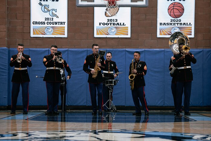 U.S. Marines with Marine Band San Diego, Headquarters and Service Battalion, MCRD San Diego, perform for students at Salesian High School in Los Angeles, California, Nov. 20, 2024. The Marine Band San Diego’s job is to provide ceremonial music, boost morale and participate in outreach work and attend events and ceremonies. (U.S. Marine Corps photo by Cpl. Sarah M. Grawcock)