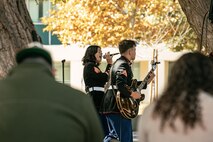 U.S. Marine Corps Sgt. Kaise Wagner, center left, and Lance Cpl. Jacob Leonard, both with Marine Band San Diego, Headquarters and Service Battalion, Marine Corps Recruit Depot San Diego, perform at California State University, Northridge, California, Nov. 20, 2024. The Marine Band San Diego’s job is to provide ceremonial music, boost morale and participate in outreach work and attend events and ceremonies. (U.S. Marine Corps photo by Cpl. Sarah M. Grawcock)