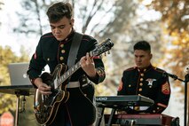 U.S. Marine Corps Lance Cpl. Jacob Leonard, left, and Sgt. Nikolas Slattery, both with Marine Band San Diego, Headquarters and Service Battalion, Marine Corps Recruit Depot San Diego, perform at California State University, Northridge, California, Nov. 20, 2024. The Marine Band San Diego’s job is to provide ceremonial music, boost morale and participate in outreach work and attend events and ceremonies. (U.S. Marine Corps photo by Cpl. Sarah M. Grawcock)