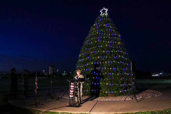 U.S. Air Force Capt. Peter Vo, 9th Reconnaissance Wing chaplain, speaks to the audience after officially lighting the tree during the annual Christmas Tree lighting at Beale Air Force Base, California, Dec. 6, 2024.